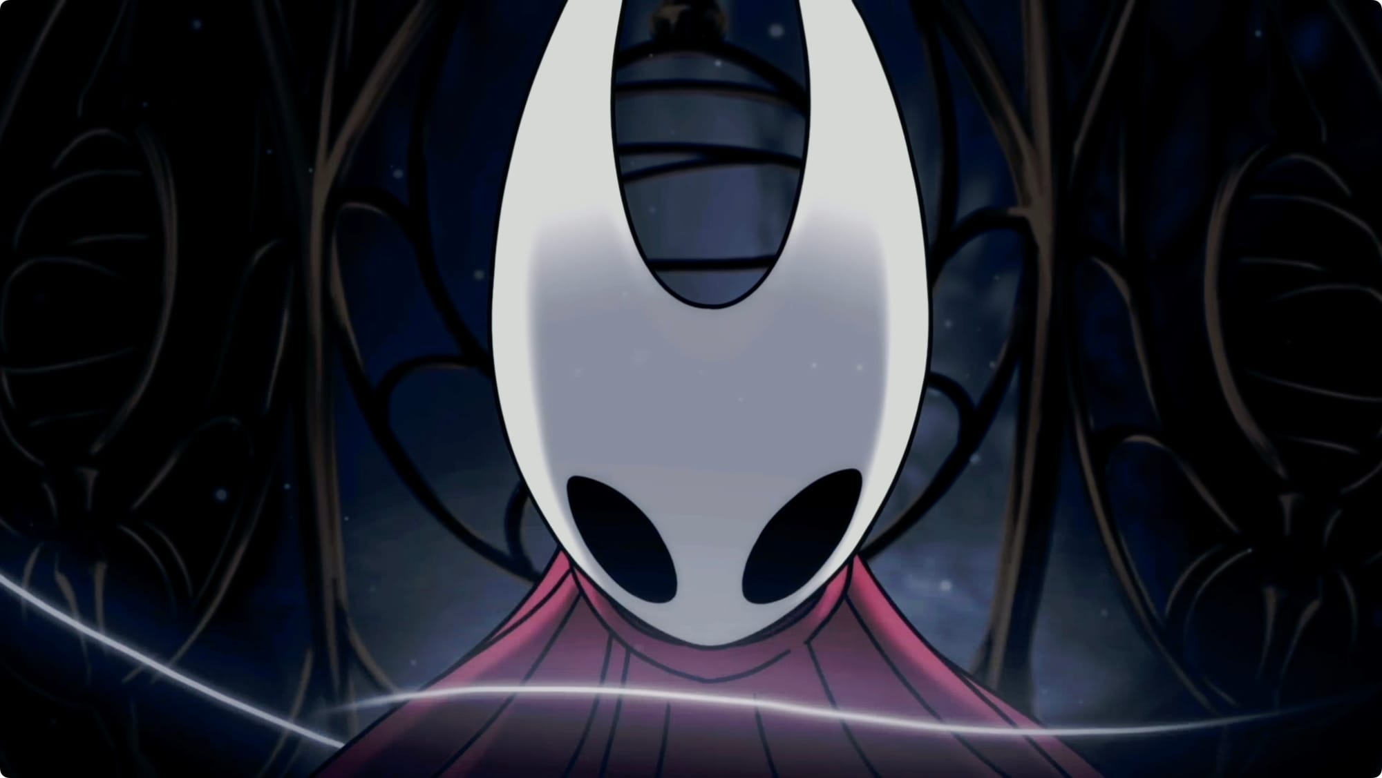 A closeup of Hornet's mask in Silksong