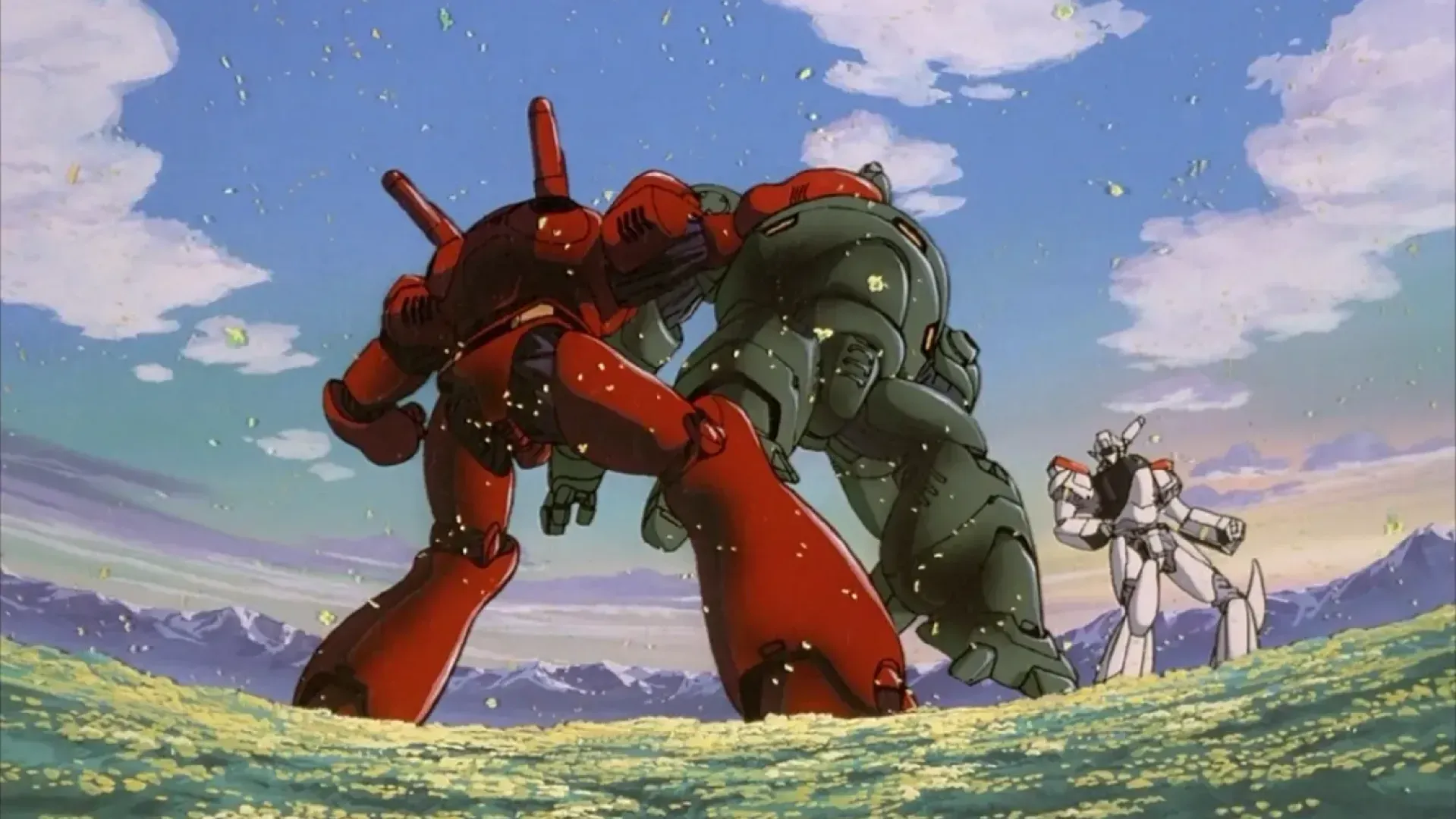 A "postcard memory" still frame from Patlabor depicting a bright blue sky and yellow flower field, where a red Labor unit is walloping a green Labor while a Patlabor stands in the background.
