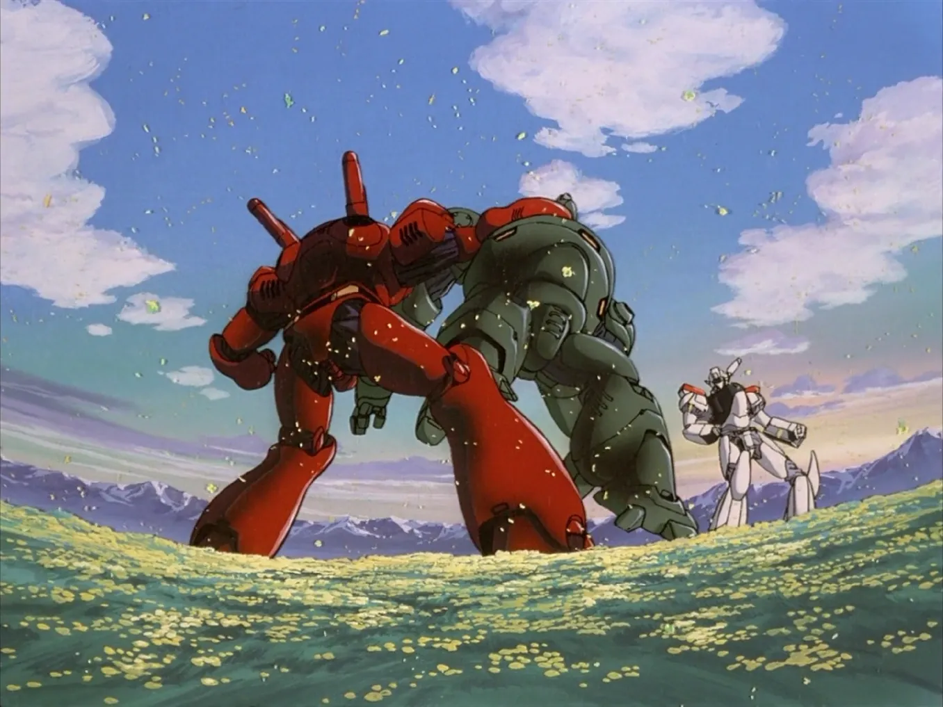 A "postcard memory" still frame from Patlabor depicting a bright blue sky and yellow flower field, where a red Labor unit is walloping a green Labor while a Patlabor stands in the background.