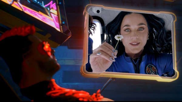 A netrunner in Cyberpunk 2077 by a floating screen showing Katy Perry in space